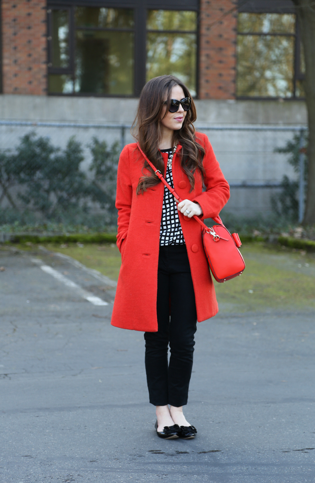 black and white outfit with pops of red
