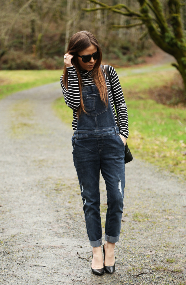 overalls with pumps and a striped turtleneck