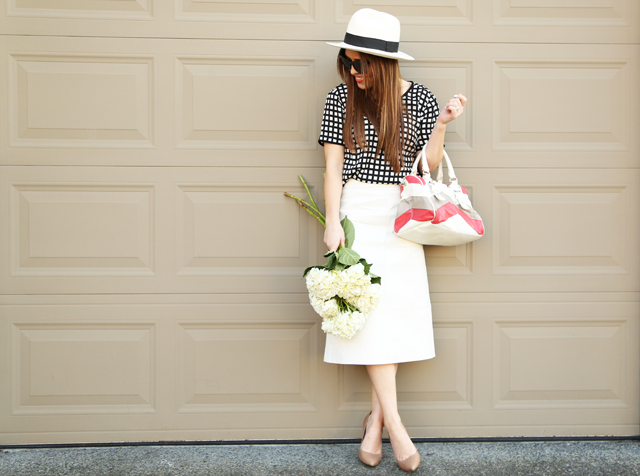 panama hat flower and a white leather skirt