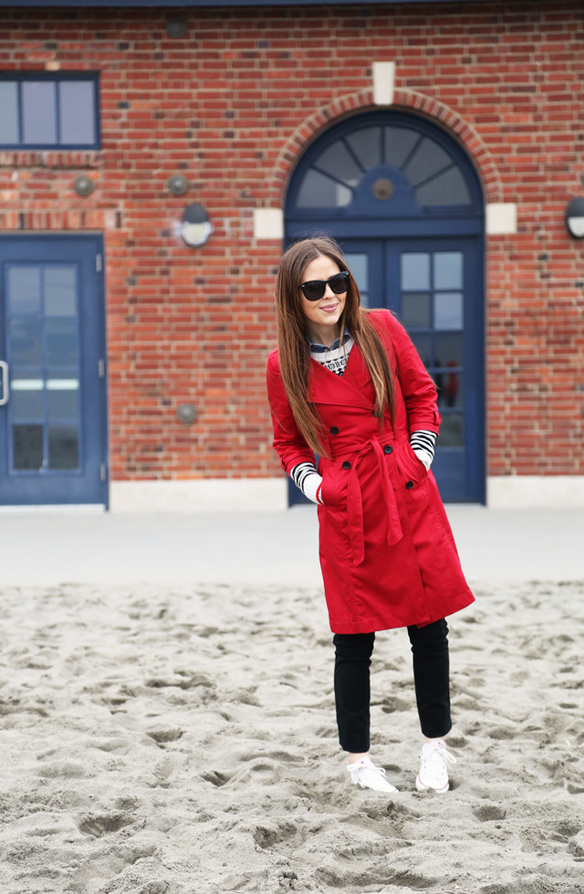 red trench and sneakers