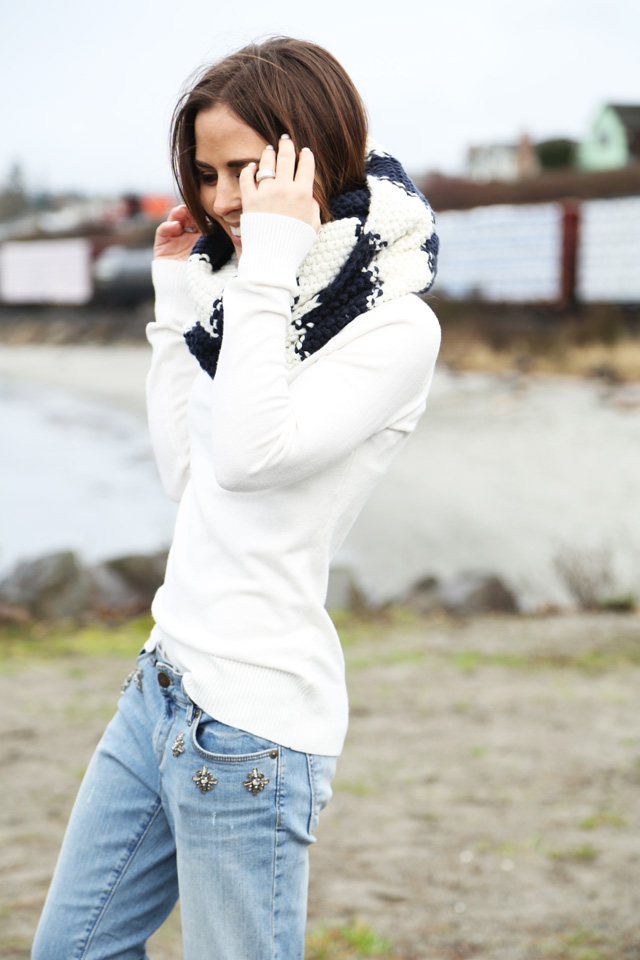 white sweater, navy striped scarf, embelished jeans