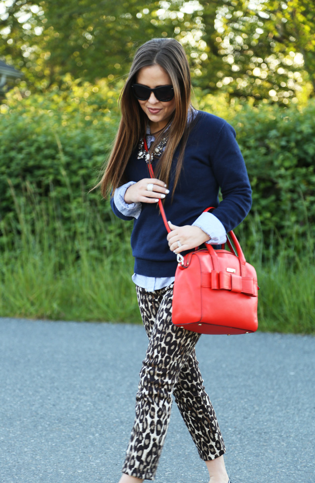 leopard kate spade pants with a red bag