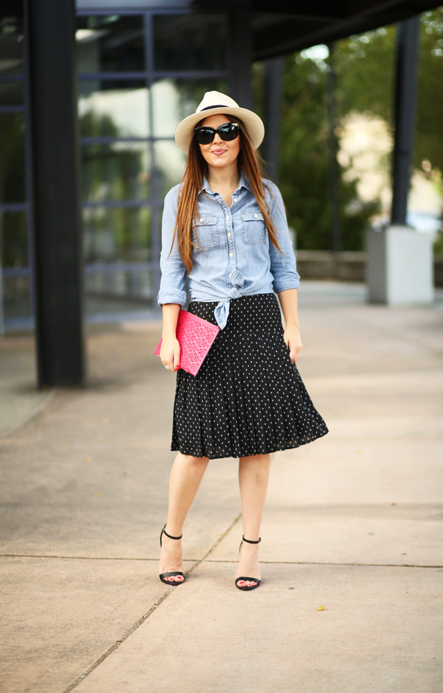 panama hat and pleated skirt
