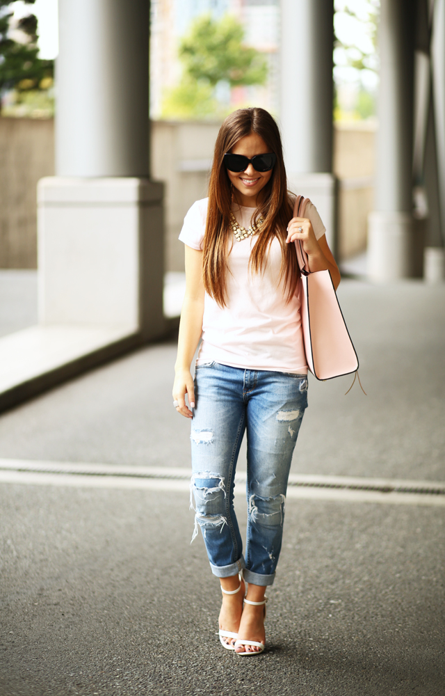 boyfriend jeans and a soft pink bag
