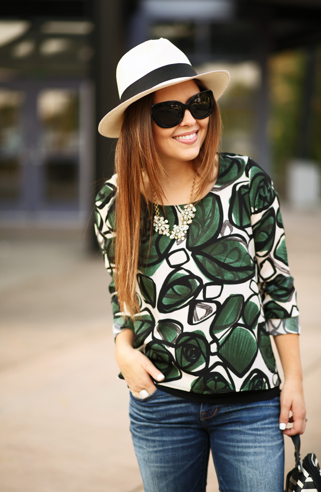 green palm print top and panama hat