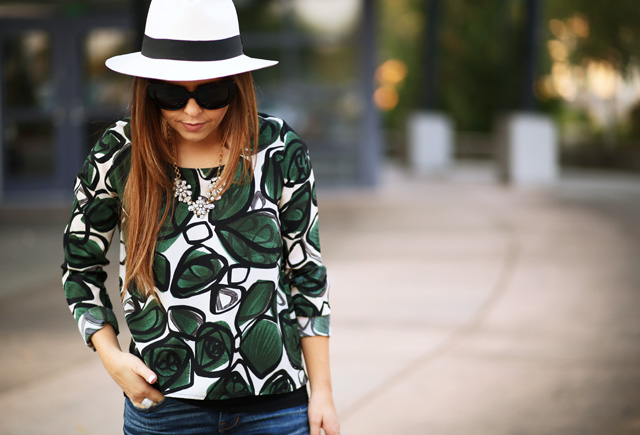 panama hat and green palm print shirt