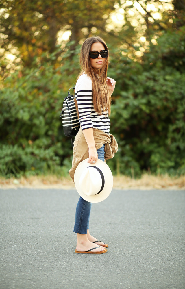 striped top and a jacket tied around waist