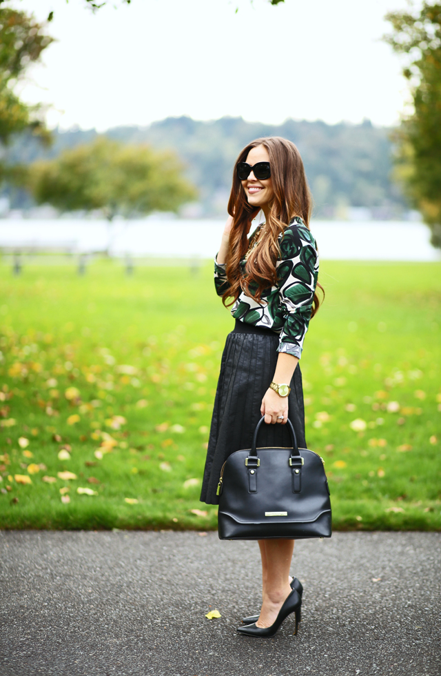 black and green outfit leather skirt and dome satchel