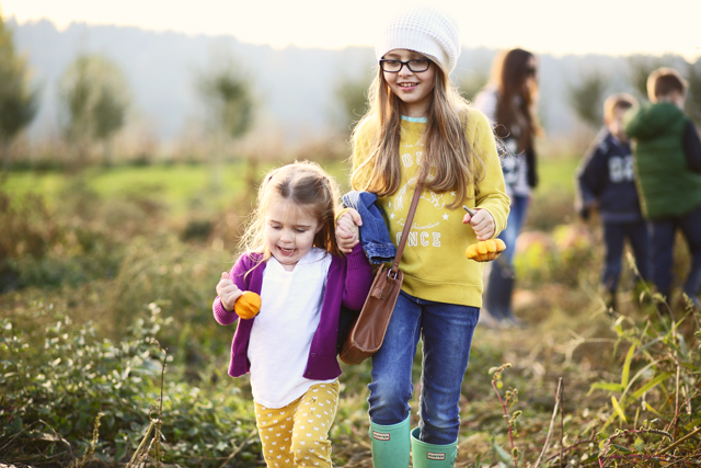 girls in the pumpkin patch