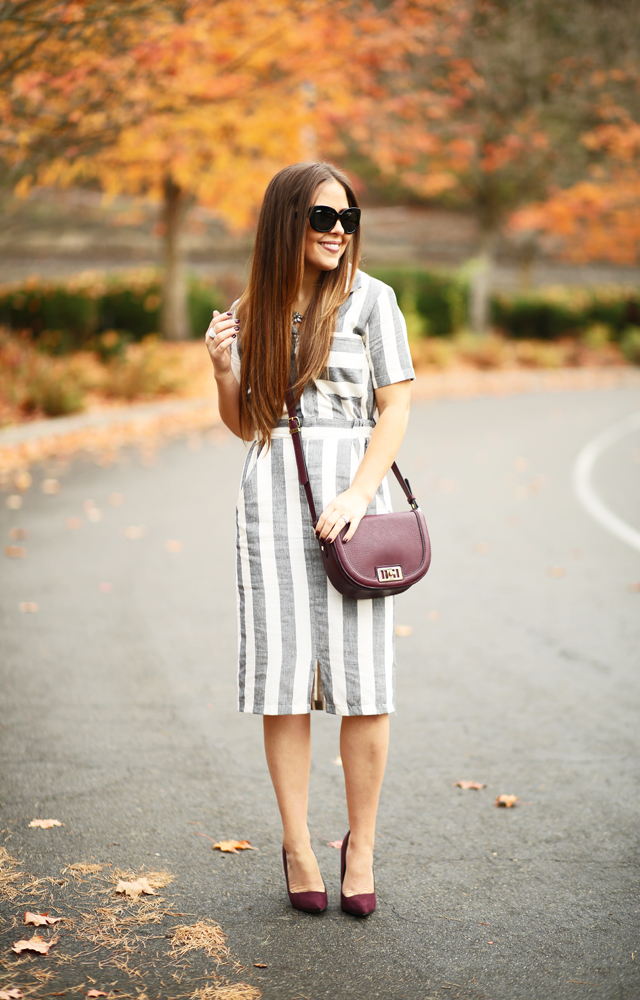 white and black striped asos shirtdress with burgundy bag and shoes