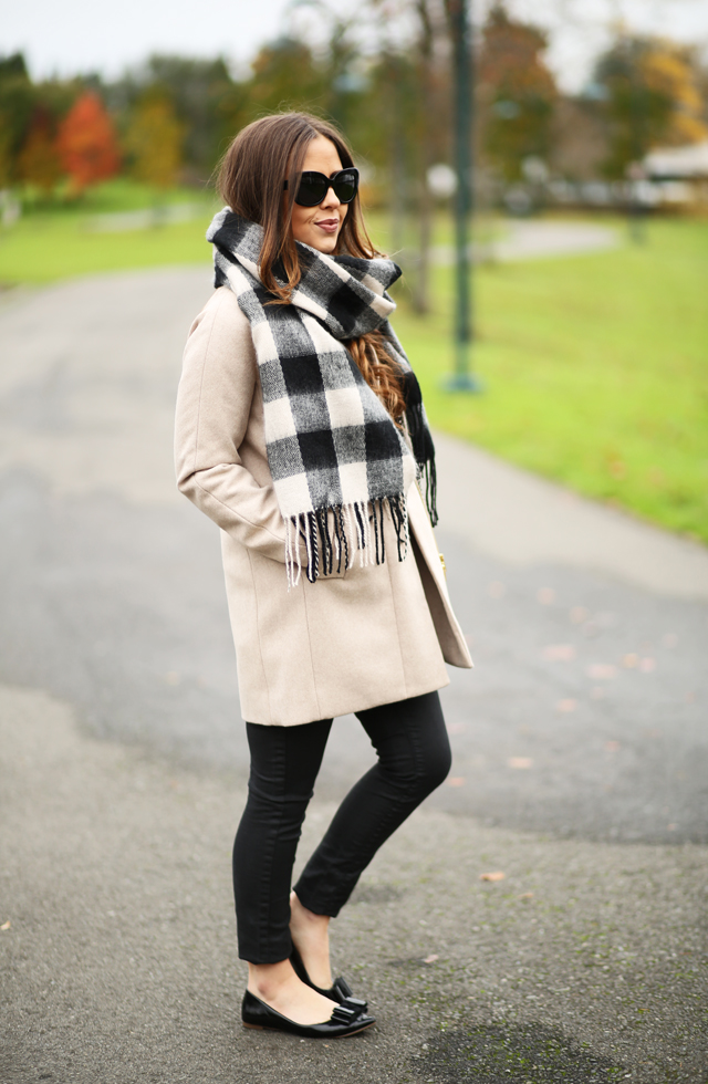 tan coat black and white scarf
