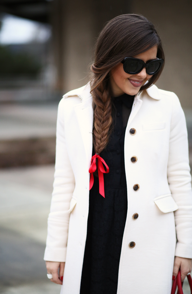 black dress white coat braid with a bow