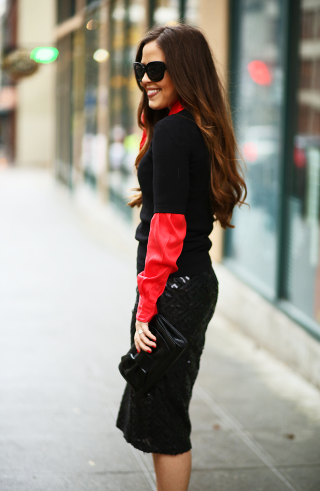 black sequin skirt and red silk blouse