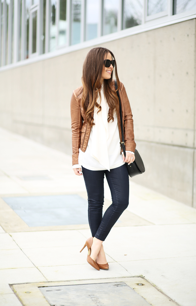 cognac bomber and cream blouse