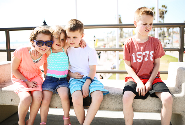4 kids at the huntington beach pier