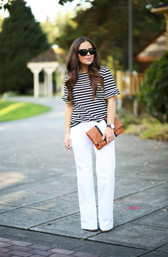 colorblock clutch white pants striped shirt