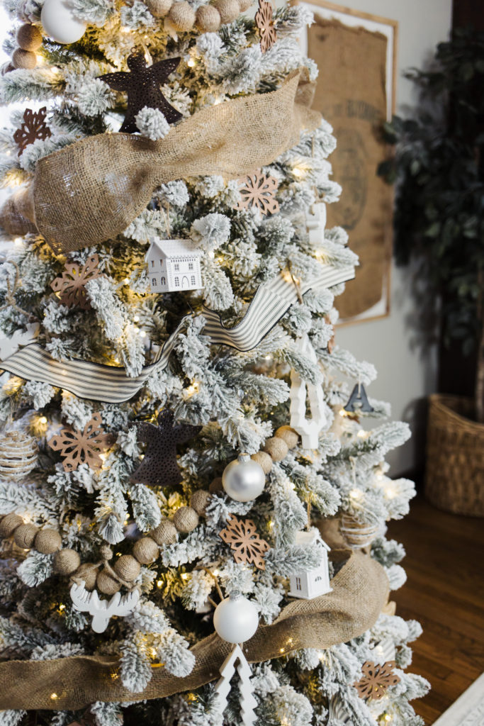a flocked French farmhouse inspired Christmas tree. - dress cori lynn