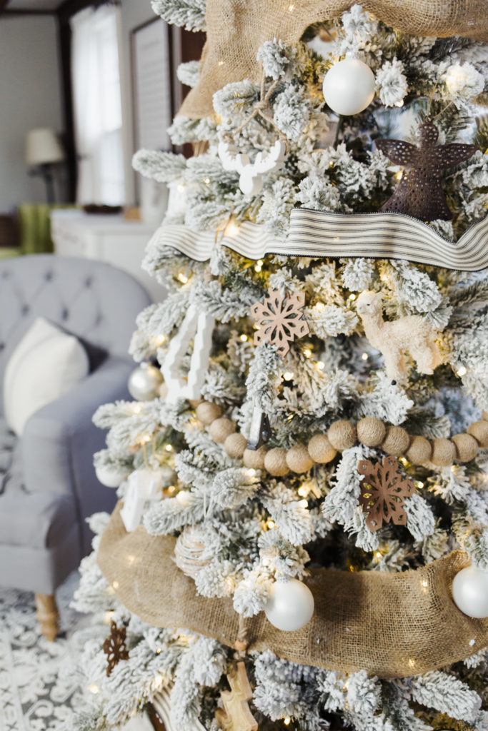 a flocked French farmhouse inspired Christmas tree. - dress cori lynn