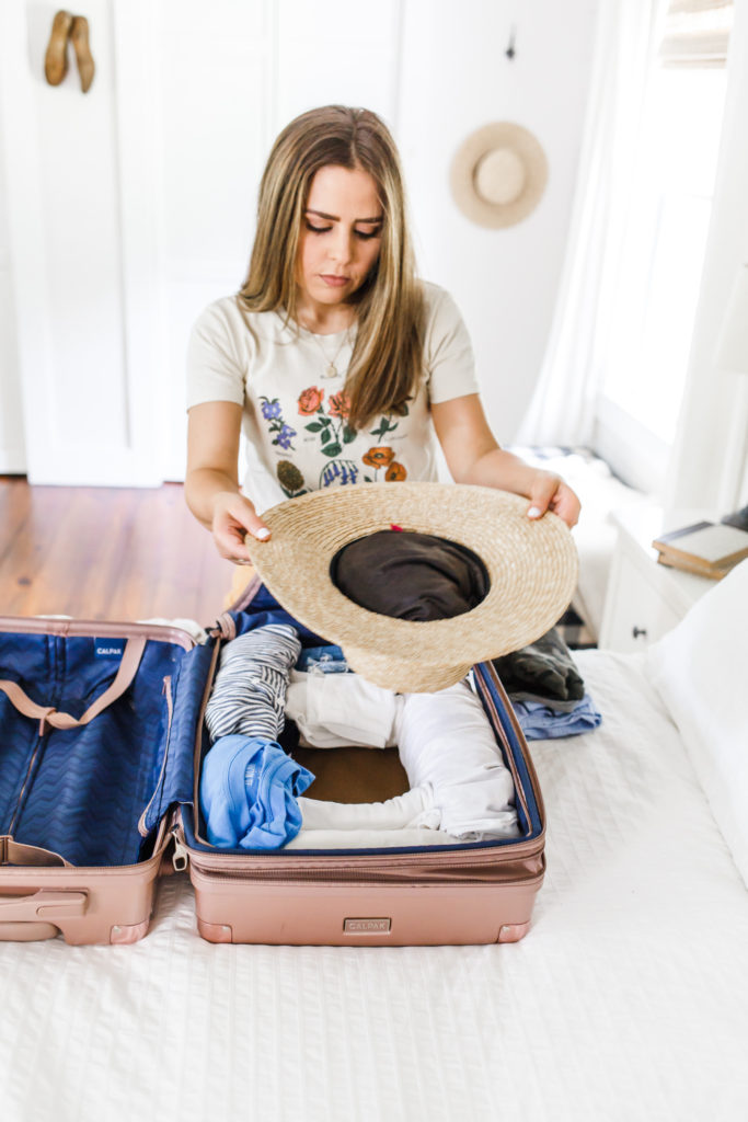 how to pack a hat in a carry-on. - dress cori lynn